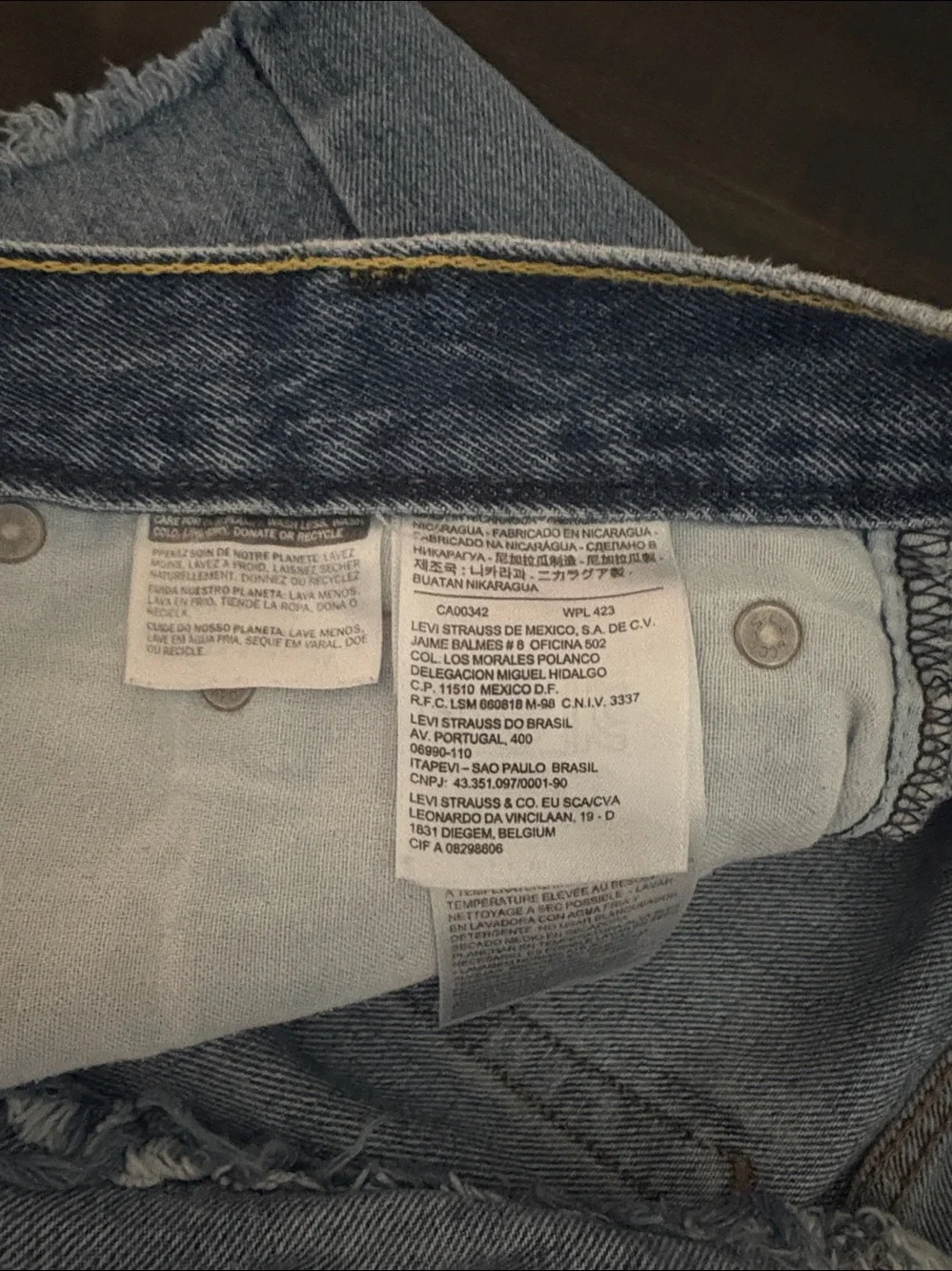 Levi's Light Blue Frayed Hem Denim Shorts